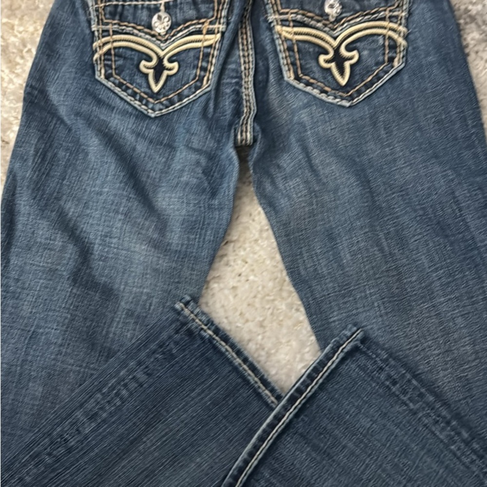 Stylish Blue Jeans with Embroidered Pockets